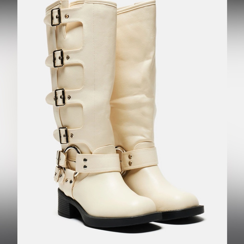 Cream knee high buckled moto boots
